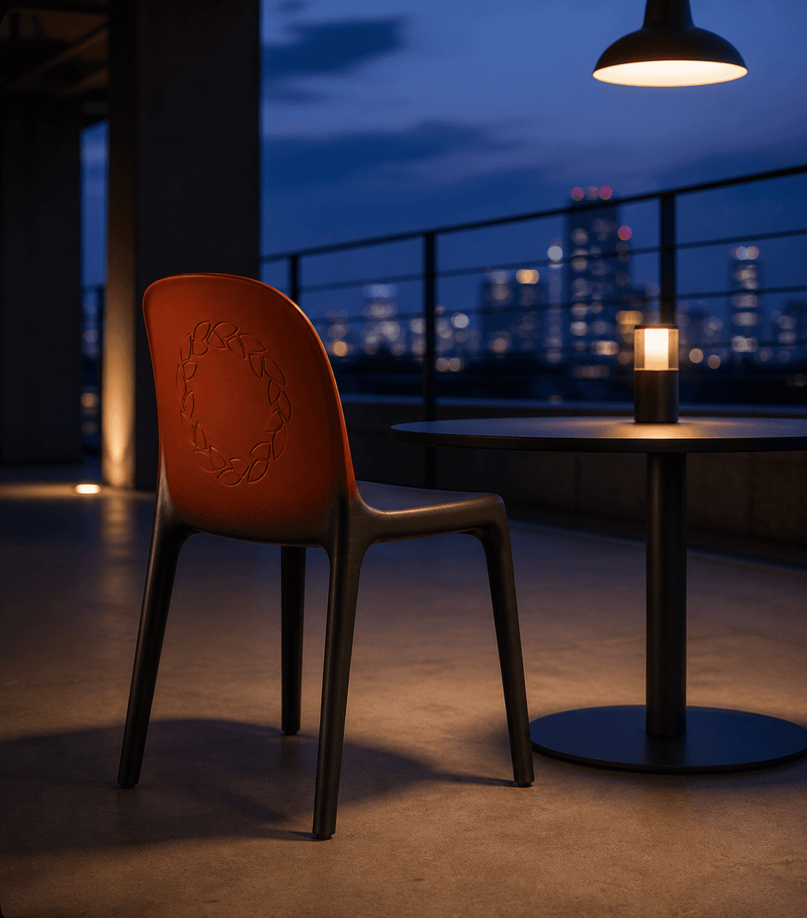 The Serotiny Chair at a rooftop café at blue hour